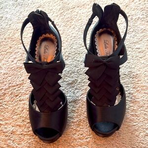 Black satin platform bow heels